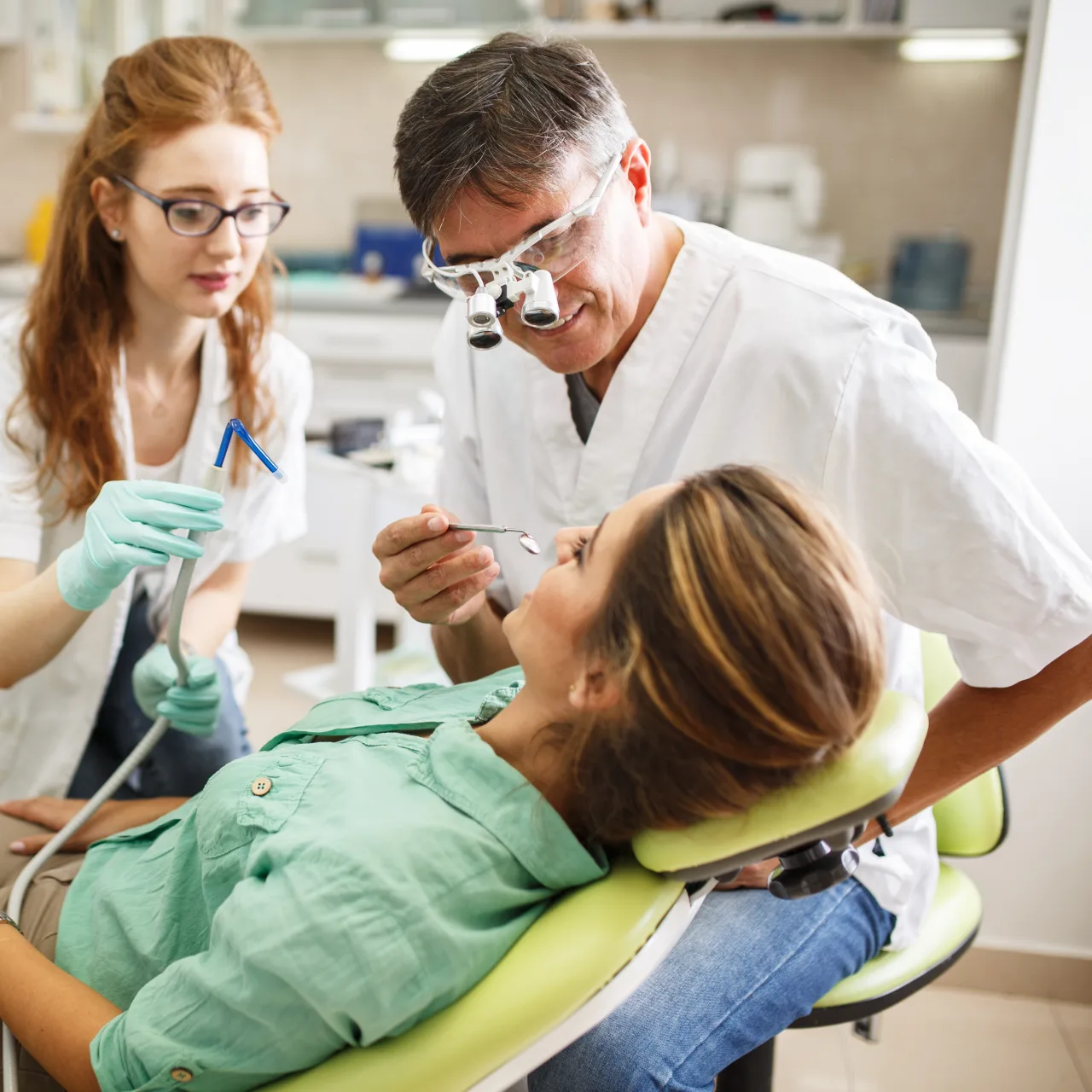Dental professional examining a patient